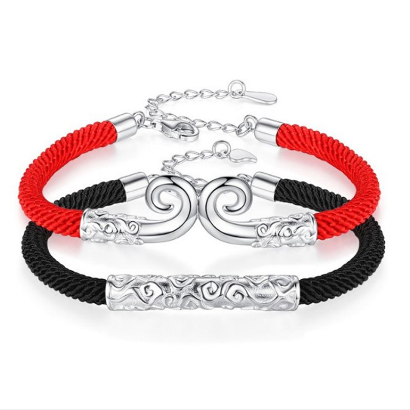 A pair of curse couple red rope bracelets